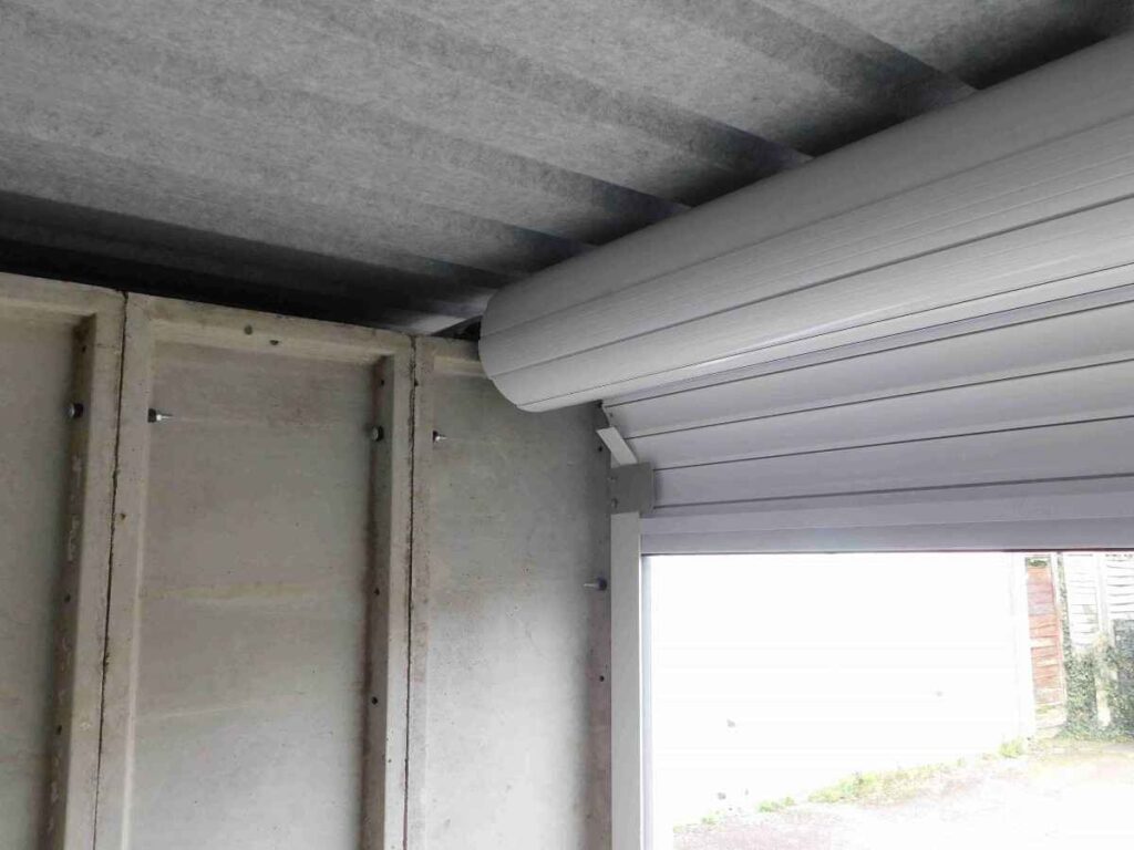 our roller shutter door with no mechanism inside concrete garage